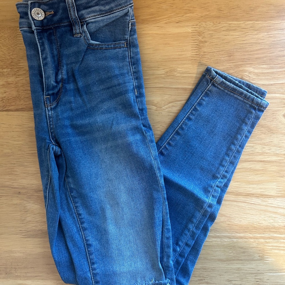 American Eagle Women's Distressed Denim High Rise Jegging Jeans